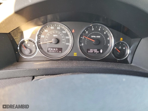 2009 Jeep Grand Cherokee Laredo with VIN 1J8GR48K89C551203, listed as a Copart auction lot 49252125 with 122,071 mi miles and Salvage Title. Bid and sale history available at carsss.com. Image 9.