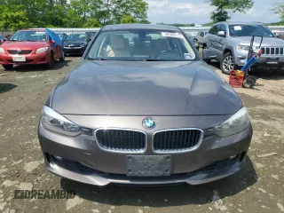 2013 BMW 3 Series 328i xDrive with VIN WBA3B5G58DNS02015, listed as a Copart auction lot 58586515 with 241,767 mi miles and Salvage title. Bid and sale history available at DreamBid. Image 5.