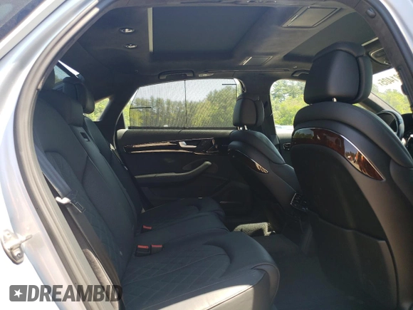 2016 Audi A8 Sport z VIN WAU43AFD7GN005425, wystawiony jako Copart lot #58781405 z przebiegiem 139 435 mil mil oraz Szkoda całkowita • Salvage title. Historia ofert i sprzedaży dostępna na DreamBid. Obrazek 10.