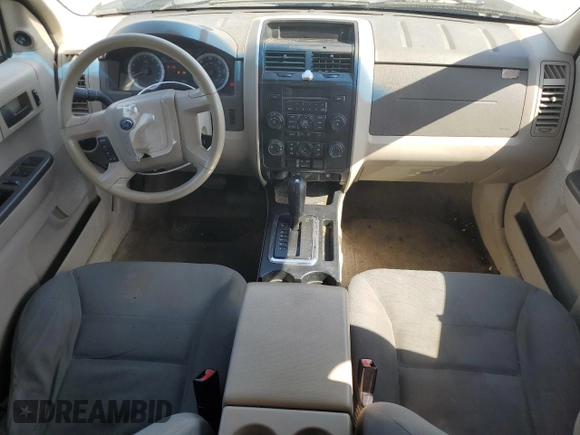 2008 Ford Escape XLS z VIN 1FMCU02ZX8KB15214, wystawiony jako Copart lot #53585195 z przebiegiem 241 310 mil mil oraz Szkoda całkowita • Salvage title. Historia ofert i sprzedaży dostępna na DreamBid. Obrazek 8.