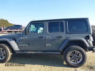 2018 Jeep Wrangler Unlimited Sahara with VIN 1C4HJXEN9JW303094, listed as a IAAI auction lot 41491564 with 66,128 mi miles and . Bid and sale history available at DreamBid. Image 14.