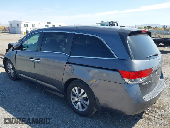 2014 Honda Odyssey EX-L with VIN 5FNRL5H67EB096027, listed as a IAAI auction lot 41950398 with 147,158 mi miles and . Bid and sale history available at DreamBid. Image 3.
