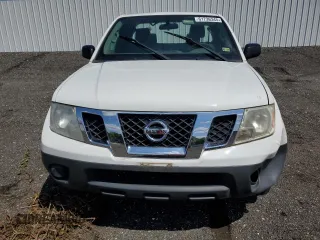 2014 Nissan Frontier S with VIN 1N6BD0CT7EN733222, listed as a Copart auction lot 61736345 with 82,691 mi miles and Salvage title. Bid and sale history available at DreamBid. Image 5.
