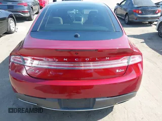2019 Lincoln MKZ Hybrid Reserve II with VIN 3LN6L5MU7KR617325, listed as a IAAI auction lot 42584481 with 76,118 mi miles and . Bid and sale history available at DreamBid. Image 16.