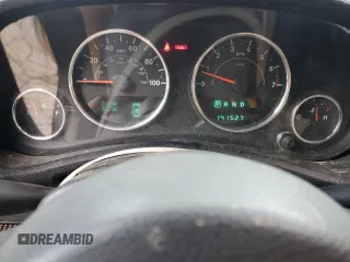 2012 Jeep Wrangler Unlimited Sport z VIN 1C4BJWDG7CL208265, wystawiony jako Copart lot #56101095 z przebiegiem 141 527 mil mil oraz Szkoda całkowita • Salvage title. Historia ofert i sprzedaży dostępna na DreamBid. Obrazek 9.