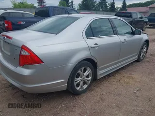 2012 Ford Fusion SE with VIN 3FAHP0HA2CR155977, listed as a IAAI auction lot 42531442 with 113,390 mi miles and . Bid and sale history available at DreamBid. Image 4.