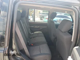 2008 Jeep Commander Sport z VIN 1J8HH48K58C126172, wystawiony jako Copart lot #61961285 z przebiegiem 235 022 mil mil oraz Szkoda całkowita • Salvage title. Historia ofert i sprzedaży dostępna na DreamBid. Obrazek 10.