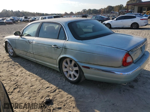 2005 Jaguar XJ with VIN SAJWA79C15SG48962, listed as a Copart auction lot 75674034 with 0 mi miles and Salvage Title. Bid and sale history available at carsss.com. Image 2.