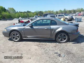 2003 Ford Mustang Standard z VIN 1FAFP40463F327753, wystawiony jako IAAI lot #42005257 z przebiegiem 325 449 mil mil oraz . Historia ofert i sprzedaży dostępna na DreamBid. Obrazek 15.