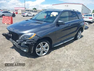 2015 Mercedes-Benz M 350 with VIN 4JGDA5JB7FA574881, listed as a IAAI auction lot 42246279 with 160,196 mi miles and . Bid and sale history available at DreamBid. Image 2.