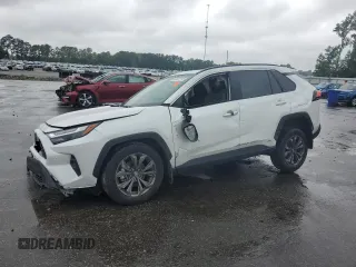 2024 Toyota RAV4 Hybrid XLE Premium with VIN 2T3B6RFV8RW074600, listed as a Copart auction lot 59560115 with 23,839 mi miles and Salvage title. Bid and sale history available at DreamBid. Image 1.