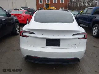 2024 Tesla Model 3 Long Range with VIN 5YJ3E1EB0RF812296, listed as a IAAI auction lot 41799217 with 6,990 mi miles. Bid and sale history available at carsss.com. Image 17.