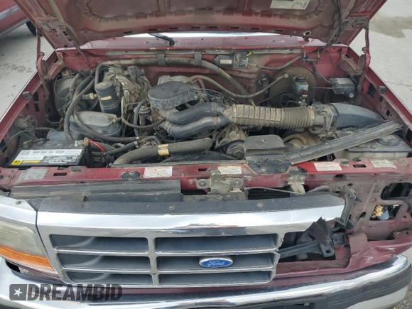1996 Ford F-150 z VIN 1FTEF15N0TLA02185, wystawiony jako Copart lot #51459355 z przebiegiem 229 421 mil mil oraz Szkoda całkowita • Salvage title. Historia ofert i sprzedaży dostępna na DreamBid. Obrazek 11.