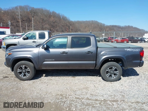 2018 Toyota Tacoma SR with VIN 5TFCZ5AN9JX123749, listed as a IAAI auction lot 41768884 with 42,852 mi miles and . Bid and sale history available at DreamBid. Image 14.