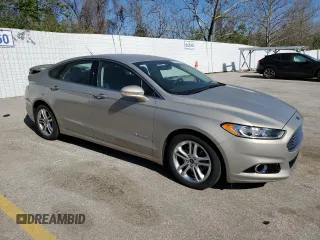 2016 Ford Fusion Titanium Hybrid with VIN 3FA6P0RU0GR153294, listed as a Copart auction lot 52723515 with 117,570 mi miles and Salvage title. Bid and sale history available at DreamBid. Image 4.
