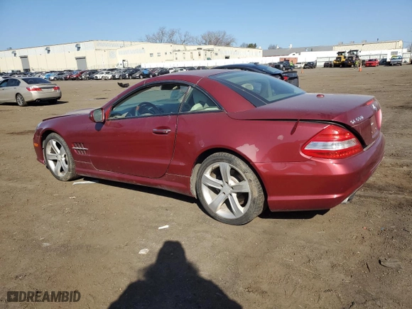 2009 Mercedes-Benz SL-Class V8 with VIN WDBSK71F29F142731, listed as a Copart auction lot 47820935 with 109,911 mi miles and Salvage Title. Bid and sale history available at carsss.com. Image 2.