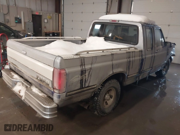 1995 Ford F-150 with VIN 1FTEX14H6SKB02515, listed as a IAAI auction lot 41574230 with 138,465 mi miles. Bid and sale history available at carsss.com. Image 4.