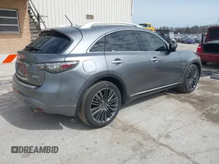 2017 Infiniti QX70 z VIN JN8CS1MW9HM412647, wystawiony jako IAAI lot #41830232 z przebiegiem 114 954 mil mil oraz . Historia ofert i sprzedaży dostępna na DreamBid. Obrazek 4.