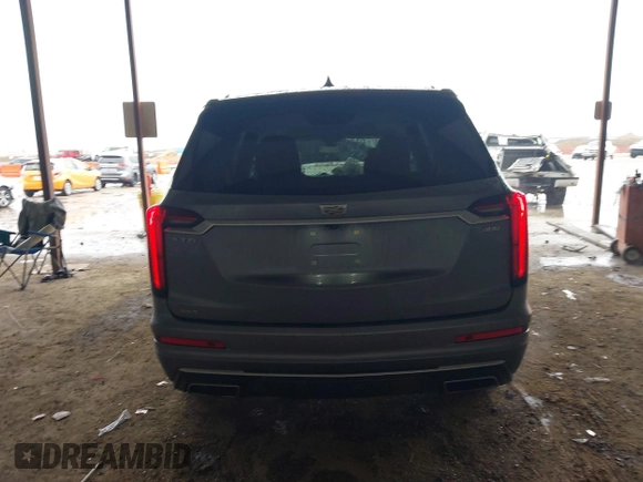 2022 Cadillac XT6 Premium Luxury z VIN 1GYKPDRS1NZ108012, wystawiony jako IAAI lot #41178333 z przebiegiem 83 987 mil mil oraz . Historia ofert i sprzedaży dostępna na DreamBid. Obrazek 16.