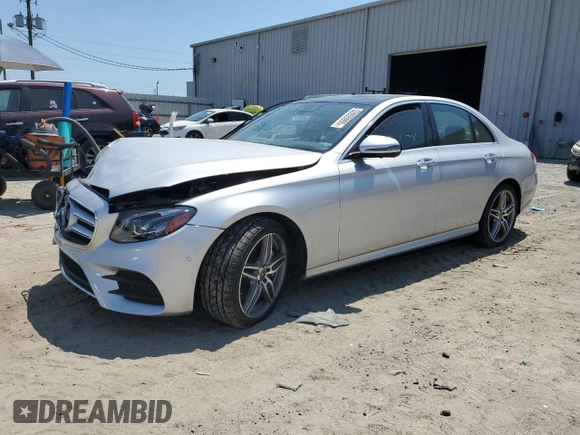 2018 Mercedes-Benz E-Class E 300 with VIN WDDZF4JB4JA380152, listed as a Copart auction lot 52855905 with 27,376 mi miles and Salvage Title. Bid and sale history available at carsss.com. Image 1.