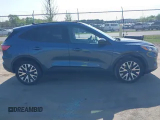 2020 Ford Escape SE Sport Hybrid with VIN 1FMCU9BZ6LUC38008, listed as a IAAI auction lot 42143784 with 81,804 mi miles and . Bid and sale history available at DreamBid. Image 13.