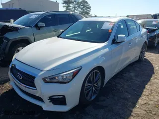 2015 Infiniti Q50 with VIN JN1BV7ARXFM390013, listed as a IAAI auction lot 41767784 with 175,739 mi miles. Bid and sale history available at carsss.com. Image 2.
