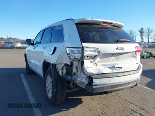 2019 Jeep Grand Cherokee Laredo E with VIN 1C4RJFAG7KC694674, listed as a IAAI auction lot 41591678 with 61,144 mi miles. Bid and sale history available at carsss.com. Image 6.
