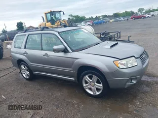 2007 Subaru Forester Special Sports XT z VIN JF1SG69637H740500, wystawiony jako IAAI lot #42231595 z przebiegiem 106 758 mil mil oraz . Historia ofert i sprzedaży dostępna na DreamBid. Obrazek 13.
