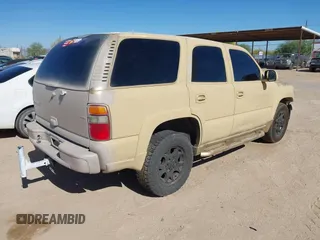 2004 Chevrolet Tahoe Z71 with VIN 1GNEK13T14R182134, listed as a IAAI auction lot 41974829 with 184,536 mi miles. Bid and sale history available at carsss.com. Image 4.