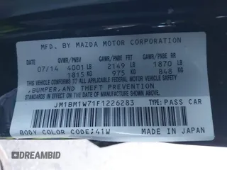 2015 Mazda 3 i Grand Touring with VIN JM1BM1W71F1226283, listed as a IAAI auction lot 41450177 with 136,621 mi miles and . Bid and sale history available at DreamBid. Image 9.