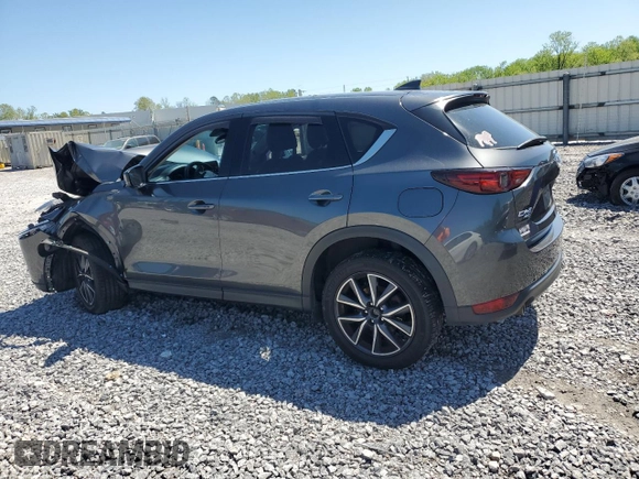 2018 Mazda CX-5 Grand Touring z VIN JM3KFBDM3J0351106, wystawiony jako Copart lot #52553925 z przebiegiem Nie podano mil oraz Szkoda całkowita • Salvage title. Historia ofert i sprzedaży dostępna na DreamBid. Obrazek 2.