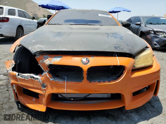 2015 BMW M6 z VIN WBSLX9C56FD160804, wystawiony jako Copart lot #57771054 z przebiegiem 57 699 mil mil oraz Szkody całkowita. Historia ofert i sprzedaży dostępna na DreamBid. Obrazek 5.