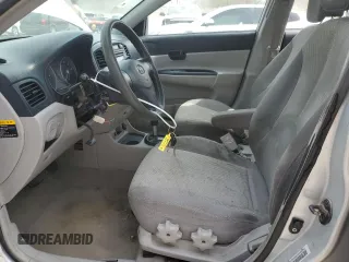 2006 Hyundai Accent GLS with VIN KMHCN46C46U048752, listed as a Copart auction lot 52930035 with 143,688 mi miles and Salvage title. Bid and sale history available at DreamBid. Image 7.