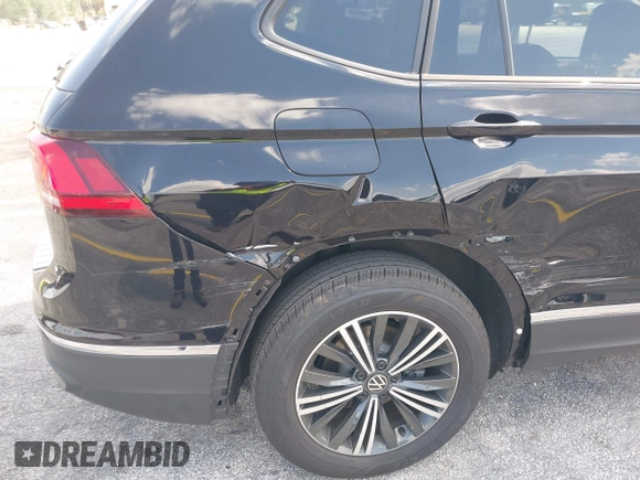 2024 Volkswagen Tiguan with VIN 3VVTB7AX6RM218502, listed as a IAAI auction lot 42063327 with 7,280 mi miles and . Bid and sale history available at DreamBid. Image 6.