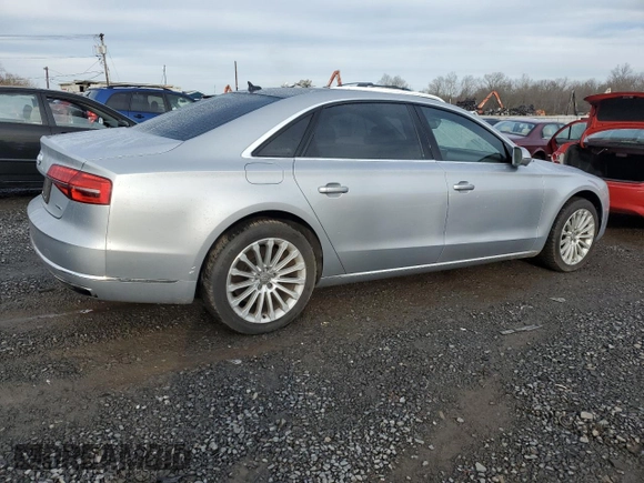 2015 Audi A8 3.0T z VIN WAU3GAFD7FN008548, wystawiony jako Copart lot #50428525 z przebiegiem 128 457 mil mil oraz Czysty tytuł • Clean title. Historia ofert i sprzedaży dostępna na DreamBid. Obrazek 3.