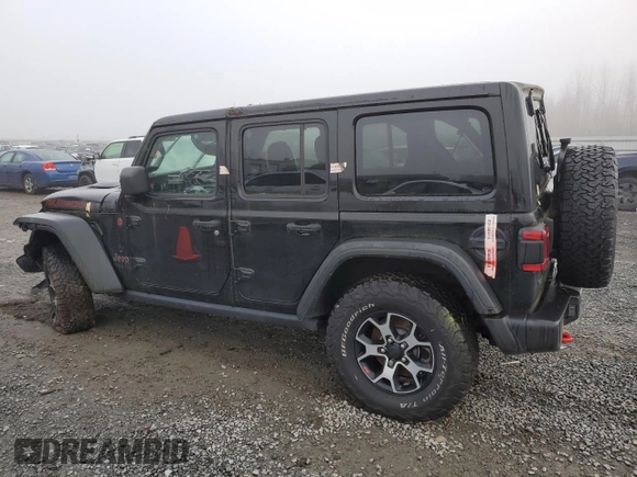 2021 Jeep Wrangler Unlimited Rubicon with VIN 1C4JJXFM7MW818199, listed as a Copart auction lot 87428474 with 18,696 mi miles and Salvage Title. Bid and sale history available at carsss.com. Image 2.