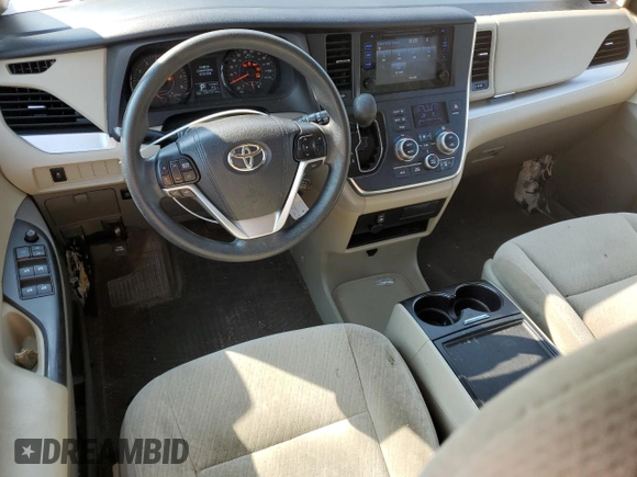 2016 Toyota Sienna LE with VIN 5TDJK3DC2GS133323, listed as a Copart auction lot 70515664 with 106,750 mi miles and Salvage Title. Bid and sale history available at carsss.com. Image 8.