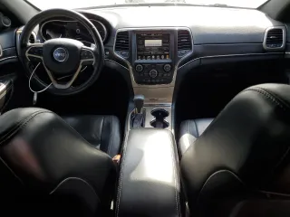 2016 Jeep Grand Cherokee Limited 75th Anniversary with VIN 1C4RJFBG3GC303588, listed as a Copart auction lot 53254915 with 130,660 mi miles and Salvage Title. Bid and sale history available at DreamBid. Image 8.