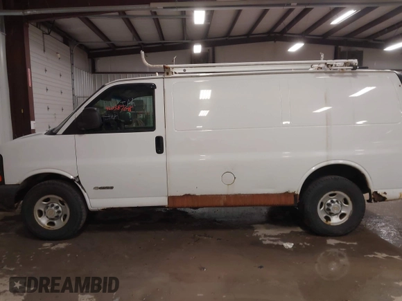 2004 Chevrolet Express Cargo Van with VIN 1GCGG25U641135906, listed as a IAAI auction lot 42038768 with 129,677 mi miles. Bid and sale history available at carsss.com. Image 6.