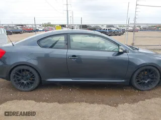 2007 Scion tC Spec with VIN JTKDE177X70160319, listed as a IAAI auction lot 41864140 with 200,184 mi miles. Bid and sale history available at carsss.com. Image 13.