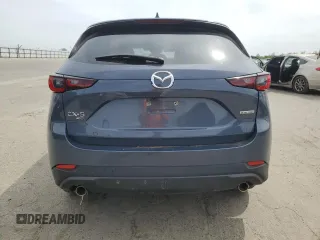 2024 Mazda CX-5 S Carbon Edition z VIN JM3KFBCL2R0521170, wystawiony jako Copart lot #53203485 z przebiegiem Nie podano mil oraz Nie do naprawy. Historia ofert i sprzedaży dostępna na DreamBid. Obrazek 6.