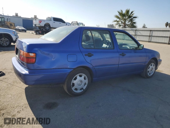 1998 Volkswagen Jetta z VIN 3VWRB81H3WM156525, wystawiony jako Copart lot #42262735 z przebiegiem 83 473 mil mil oraz Czysty tytuł • Clean title. Historia ofert i sprzedaży dostępna na DreamBid. Obrazek 3.