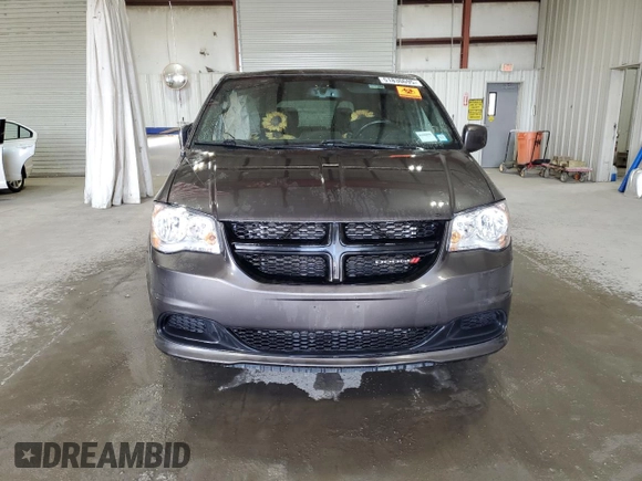 2014 Dodge Grand Caravan SE with VIN 2C4RDGBG6ER463529, listed as a Copart auction lot 51830695 with 105,675 mi miles and Salvage Title. Bid and sale history available at DreamBid. Image 5.