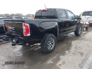 2022 GMC Canyon 4WD AT4 with VIN 1GTG6FEN0N1249453, listed as a IAAI auction lot 41513689 with 44,285 mi miles and . Bid and sale history available at carsss.com. Image 4.