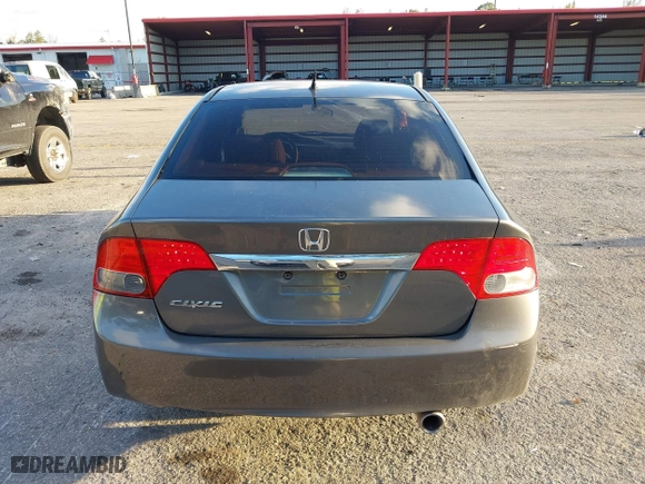 2010 Honda Civic Sdn EX with VIN 19XFA1F80AE026715, listed as a IAAI auction lot 41887154 with 128,272 mi miles. Bid and sale history available at carsss.com. Image 16.