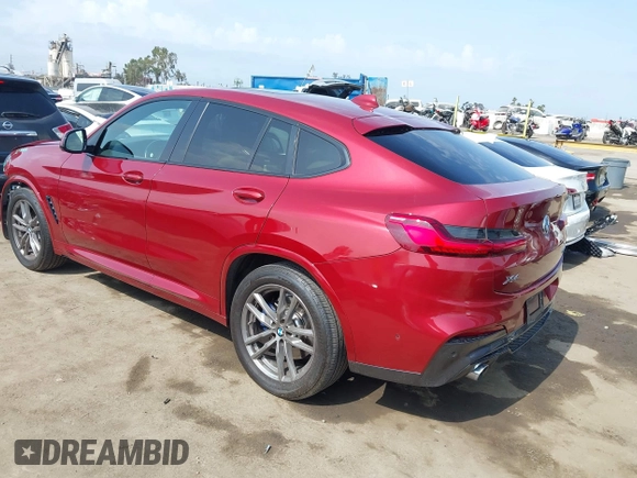 2021 BMW X4 xDrive30i with VIN 5UX2V1C09M9F29509, listed as a IAAI auction lot 42408605 with 46,992 mi miles and . Bid and sale history available at DreamBid. Image 3.