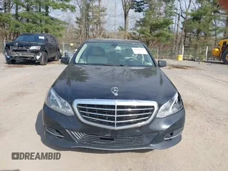 2014 Mercedes-Benz E E 350 Luxury with VIN WDDHF8JB2EA894977, listed as a IAAI auction lot 42065062 with 197,393 mi miles. Bid and sale history available at carsss.com. Image 12.