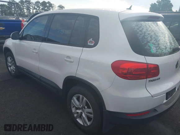 2013 Volkswagen Tiguan SE z VIN WVGAV7AX4DW555154, wystawiony jako IAAI lot #42200452 z przebiegiem 190 745 mil mil oraz . Historia ofert i sprzedaży dostępna na DreamBid. Obrazek 3.