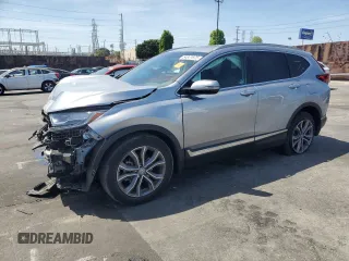 2020 Honda CR-V Touring z VIN 7FARW1H92LE002180, wystawiony jako Copart lot #54341875 z przebiegiem 40 354 mil mil oraz Szkoda całkowita • Salvage title. Historia ofert i sprzedaży dostępna na DreamBid. Obrazek 1.