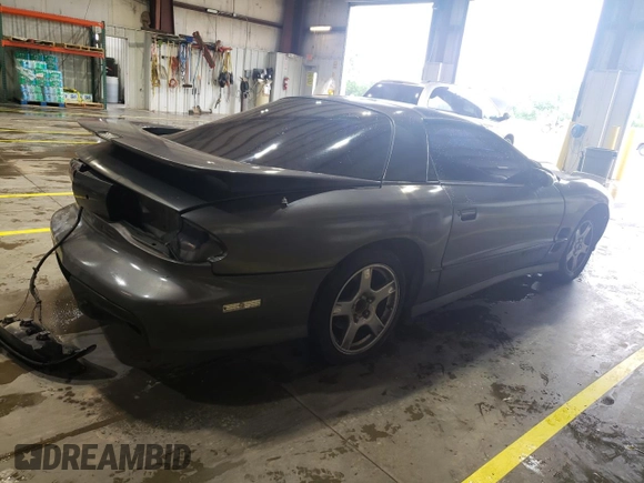 1999 Pontiac Firebird Formula с VIN 2G2FV22G1X2211237, выставлен на аукционе Copart как лот 57750415 с пробегом 134 236 миль миль и Списание • Salvage title. История ставок и продаж доступна на DreamBid. Изображение 3.
